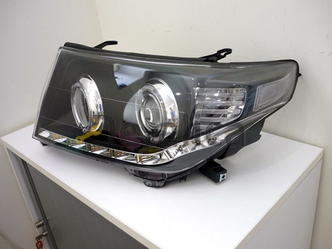 Фары тюнинг-комплект светящиеся ободки EAGLE EYES внутри черные для Тойота Лэнд Крузер 200