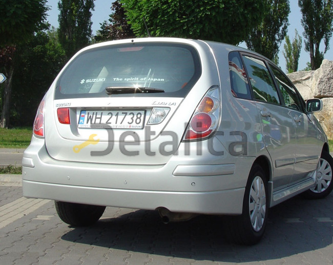 Бампер задний для Сузуки Лиана хетчбэк оригинал