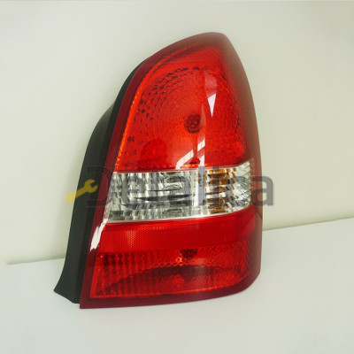 Фонарь задний правый для Ниссан Примера Р12 седан оригинал