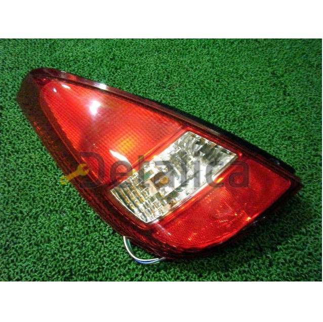 Фонарь задний левый для Сузуки Лиана хетчбэк оригинал красно-белый