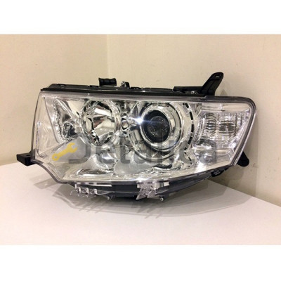 Фара левая для Митсубиси L200 ксенон