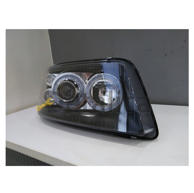 Фары тюнинг-комплект линзованные со светящимся ободком с рег мотора внутри черные для Фольксваген Транспортер Т5 2003-2009 (Depo)