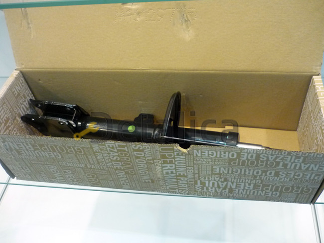 Стойка амортизатора передняя левая для Ниссан Террано D10 оригинал