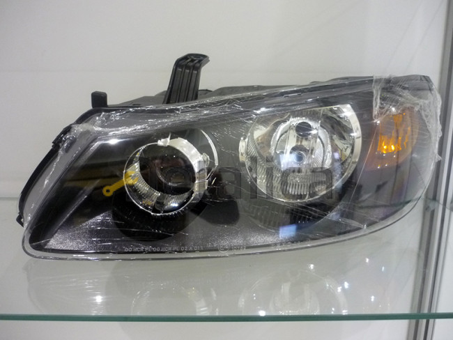 Фара левая для Ниссан Альмера Н16 внутри чёрная