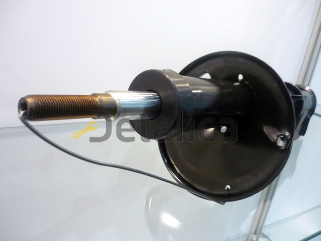 Стойка амортизатора передняя правая для Ниссан Террано D10 оригинал