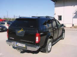 Задний борт пикапа Ниссан Навара