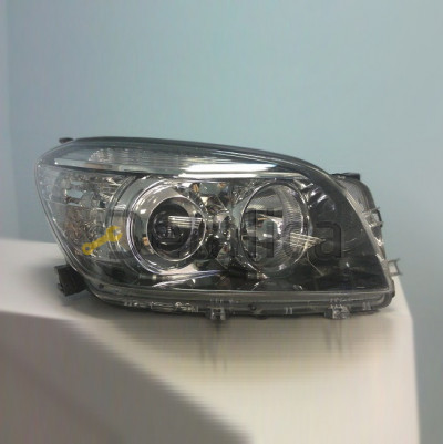 Фара правая под корректор 2.4 оригинал внутри хром-черный для тойота рав 4 2006-2008