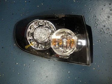 Mazda 3 фонарь задн внешн лев (седан) прозрач с диод габарит, стоп сигнал (Китай)