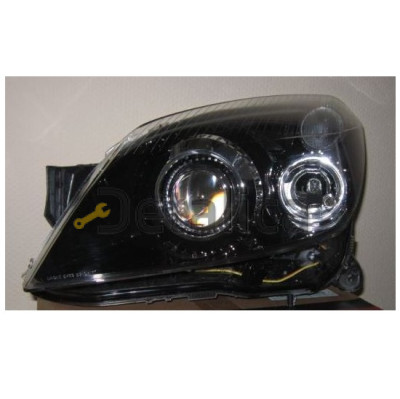 Фара левая ксенон с регулятором мотора  EAGLE EYES внутри черная для Опель Астра H GTC