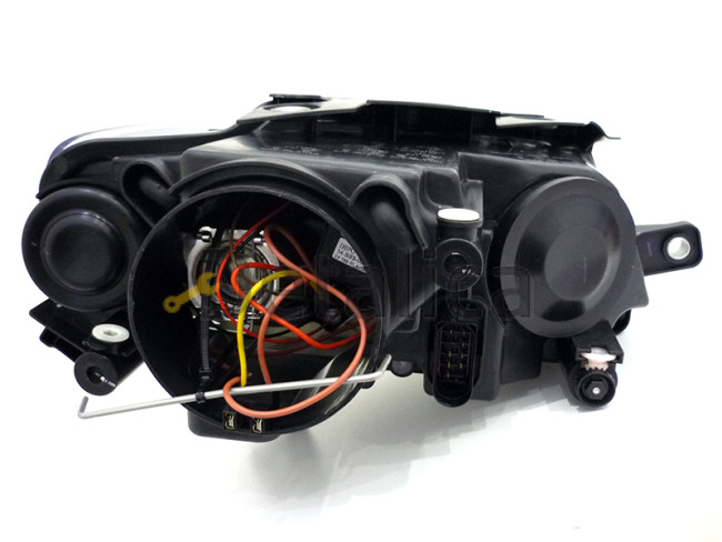 Фара левая с рег мотора линзованная внутри черная для Фольксваген Пассат Б6 от 2005 (Depo)