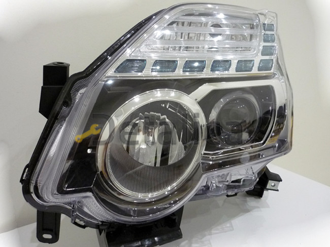 Фара левая для Ниссан Х-Трейл Т31 рестайл с линзой оригинал